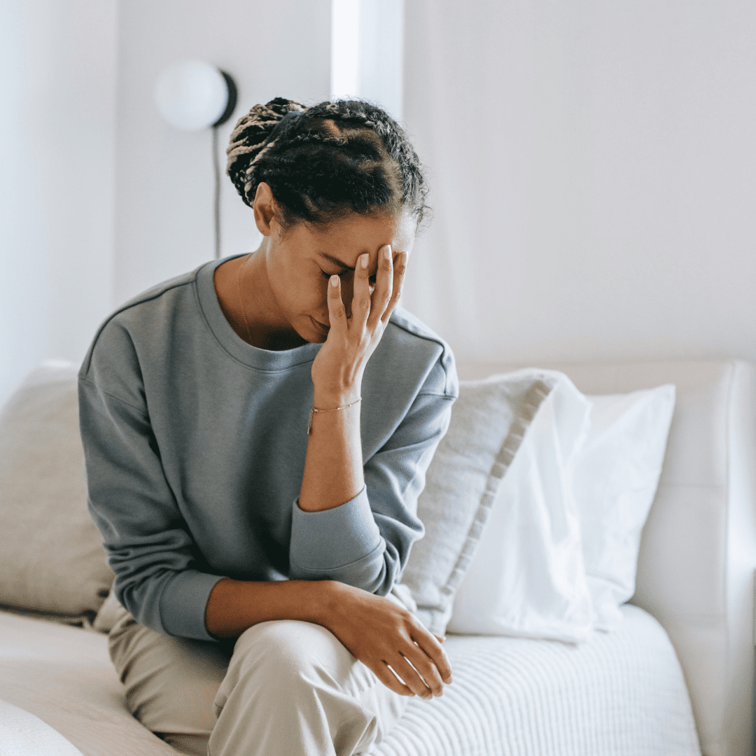 Black woman wondering why she always feels stuck in life
