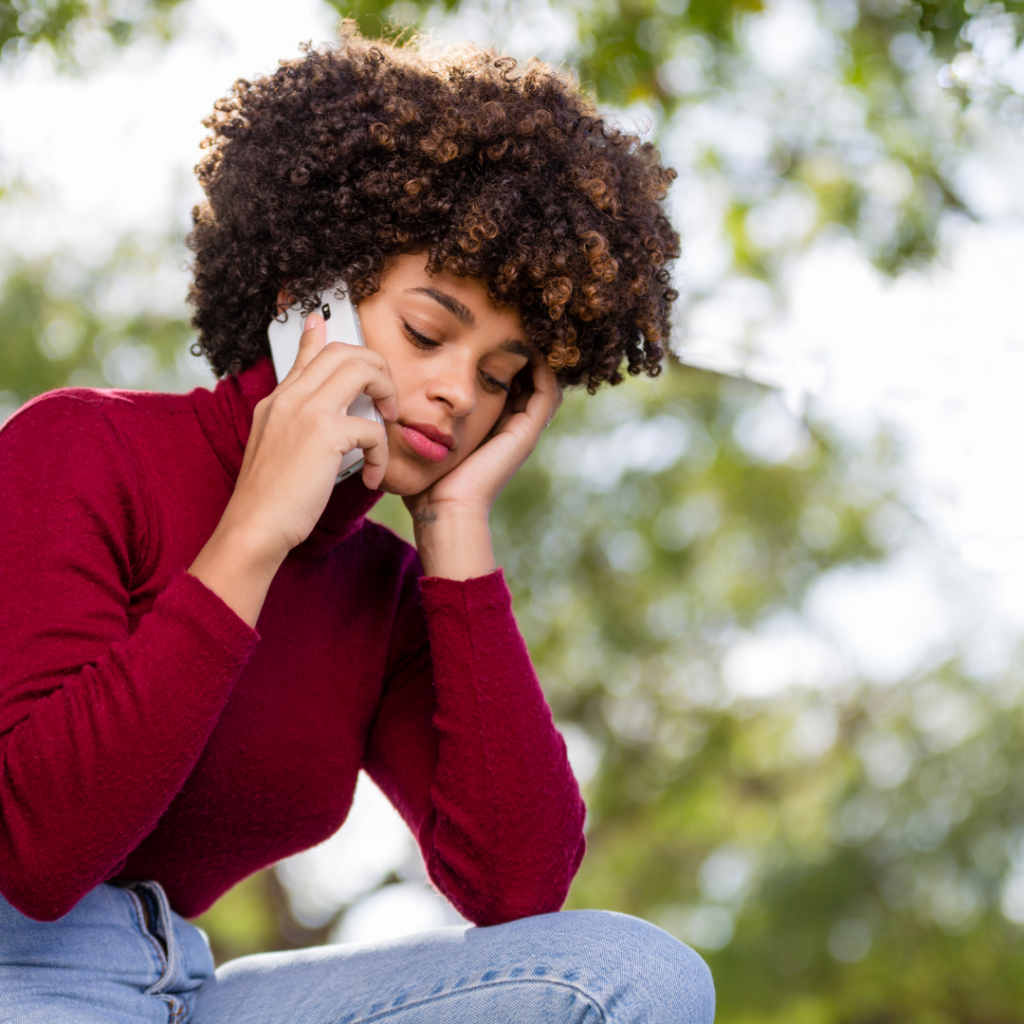 Black woman frustrated and unsure of the signs of a toxic relationship