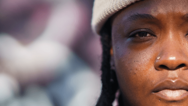 Close shot of young Black woman with a serious look, LGBTQ-friendly | Coping with cancer diagnosis | The Love Your Mind Project