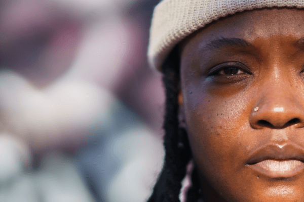 Close shot of young Black woman with a serious look, LGBTQ-friendly | Coping with cancer diagnosis | The Love Your Mind Project