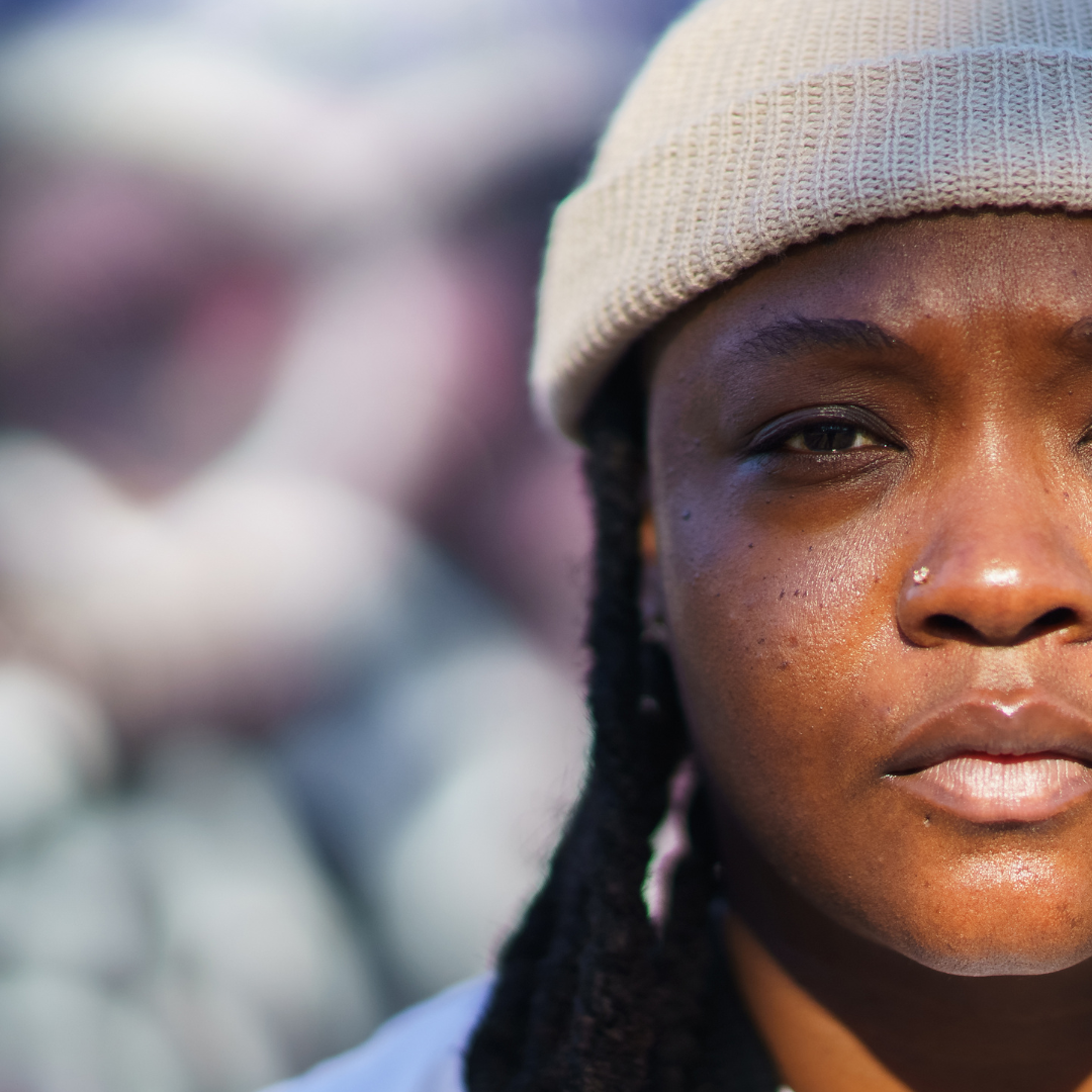 Close shot of young Black woman with a serious look, LGBTQ-friendly | Coping with cancer diagnosis | The Love Your Mind Project